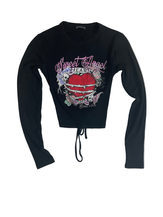 Black long-sleeve crop top with graphic design on a white background