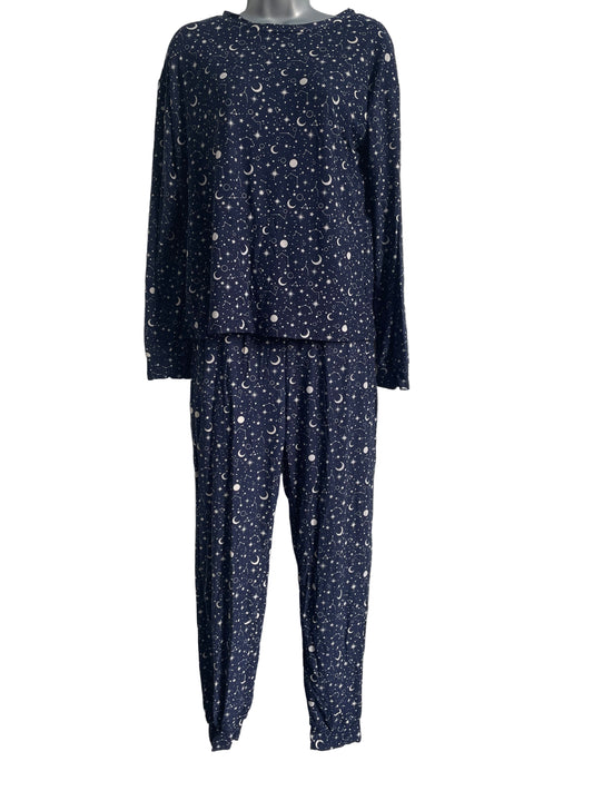 Navy blue fabric with white celestrial  stars and half moons.