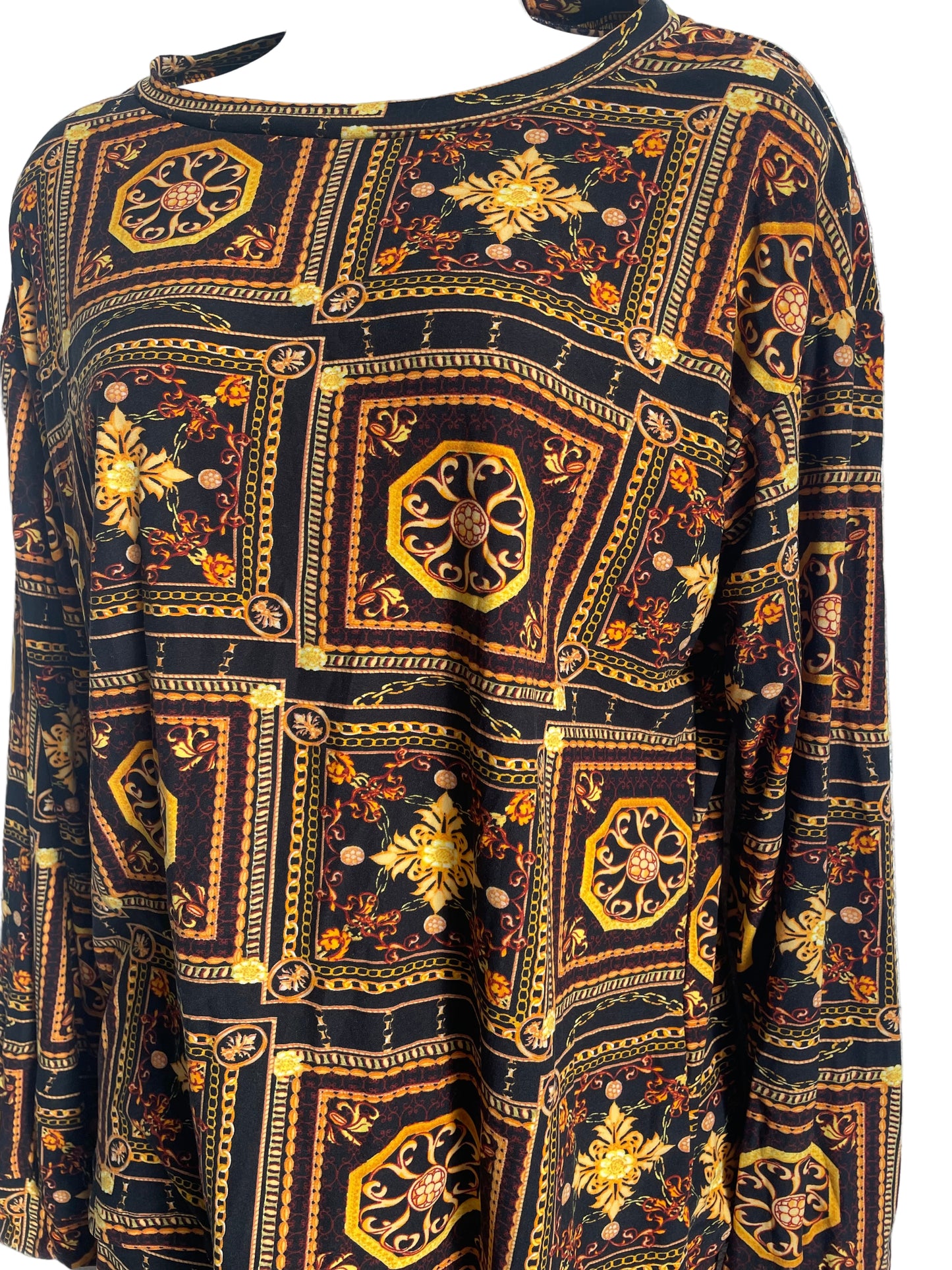 Decorative fabric with intricate patterns on a white background